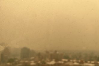 a city skyline seen through hazy air