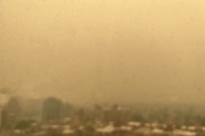 a city skyline seen through hazy air