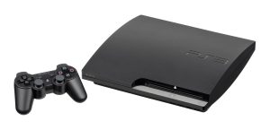 A PlayStation console with its wireless controller