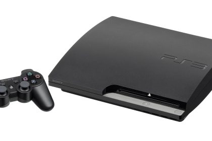 A PlayStation console with its wireless controller